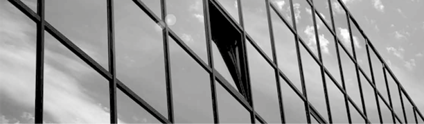 Business building against the blue sky and beautiful clouds